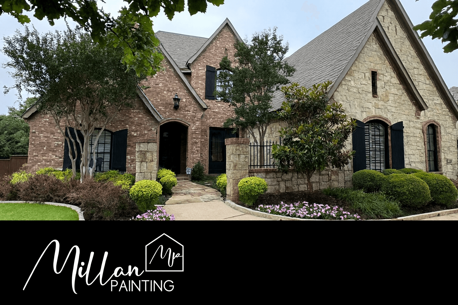 Beautiful brick and stone Texas home freshly painted by Millan Painting, showcasing premium craftsmanship, lush landscaping, and the company’s signature professional finish.