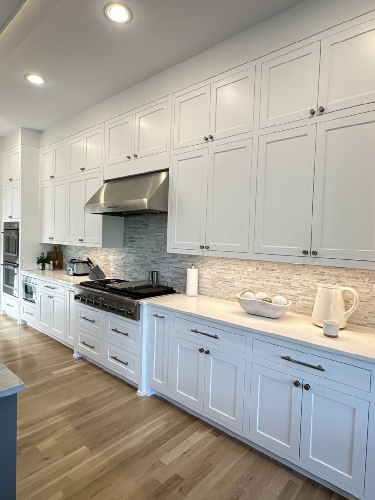 White kitchen cabinets painted by Millan Painting